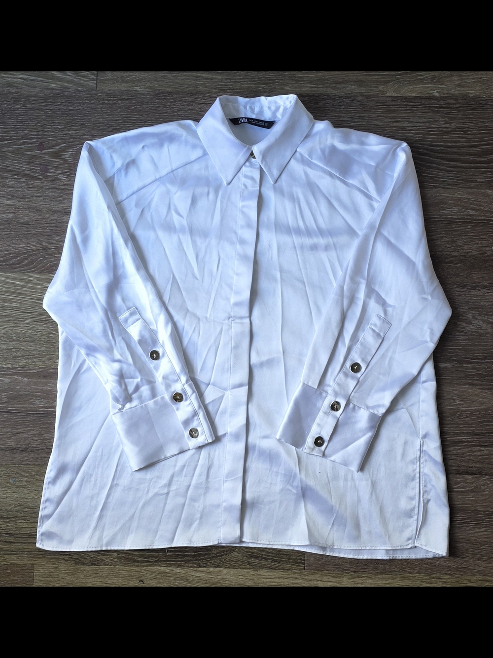 white satin Zara shirt with metal buttons on the cuffs. Size S